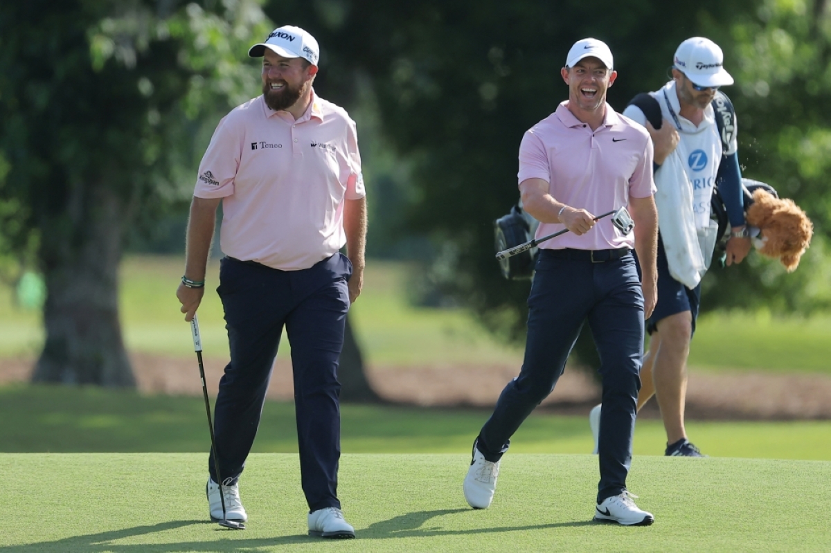 NICE VIBE Shane Lowry of Ireland and Rory McIlroy of Northern Ireland react on the 15th hole during the first round of the Zurich Classic of New Orleans at TPC Louisiana on Thursday, April 25, 2024, in Avondale, Louisiana. PHOTO BY JONATHAN BACHMAN/AFP